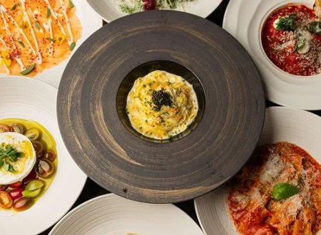 Wevino Dining Room Set For Dinner With Wine Glasses, Ambient Lighting, And Elegant Modern Italian Decor In Westlake Village.